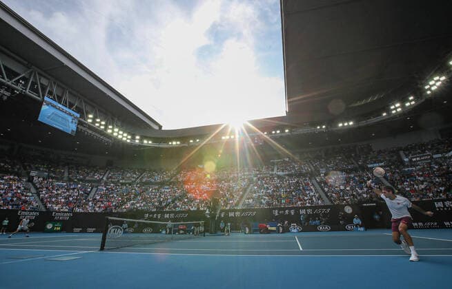 (200128) -- MELBOURNE, Jan. 28, 2020 -- Rodger Federer of Switzerland hits a return during the men s singles quarterfinal match against Tennys Sandgren of the United States at the Australian Open tennis championship in Melbourne, Australia on Jan. 28, 2020. ) (SP)AUSTRALIA-MELBOURNE-TENNIS-AUSTRALIAN OPEN-DAY 9 BaixXuefei 