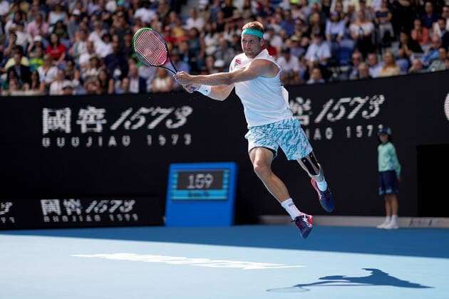 AUSTRALIAN OPEN DAY 9, Tennys Sandgren of the USA plays a return shot during his fifth round match against Roger Federer of Switzerland on day nine of the Australian Open tennis tournament at Rod Laver Arena in Melbourne, Tuesday, January 28, 2020. ( NO ARCHIVING, EDITORIAL USE ONLY, NO USE IN BOOKS WITHOUT CONSENT MELBOURNE VIC AUSTRALIA  Copyright: xMICHAELxDODGEx 20200128001445219871