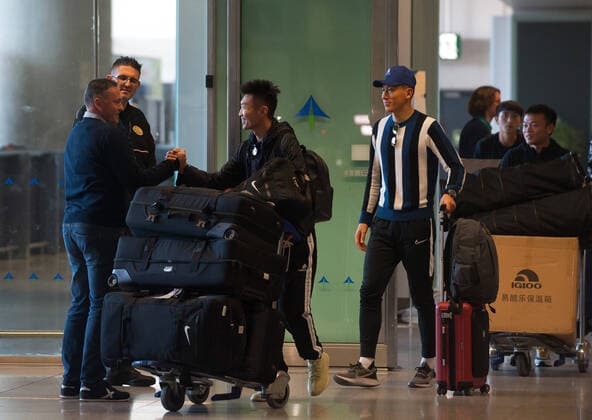 January 29, 2020, Malaga, Spain: Football players at Malaga Costa del Sol airport..Wuhan Zall FC Chinese soccer team arrives at Malaga Costa del Sol airport for a pre-season training in Cadiz province. According to the Andalusia and Spanish government, the players are not infected with the Corona virus and during their stay, they will be subjected to health controls. The team will be in Andalusia until 15 February. Wuhan Zall FC team players in Malaga, Spain - 29 Jan 2020 - ZUMAs197 96526849st Copyright: xJesusxMeridax