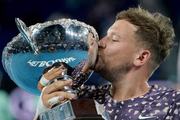 AUSTRALIAN OPEN DAY 13, Dylan Alcott of Australia kisses the trophy after winning the men s Quad Wheelchair singles final against Andy Lapthorne of Great Britain on day 13 of the Australian Open tennis tournament at Rod Laver Arena in Melbourne, Saturday, February 1, 2020. ( NO ARCHIVING, EDITORIAL USE ONLY, NO USE IN BOOKS WITHOUT CONSENT MELBOURNE VIC AUSTRALIA  Copyright: xMICHAELxDODGEx 20200201001446064533