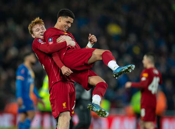 (200205) -- LIVERPOOL, Feb. 5, 2020 -- Liverpool s Sepp Van Den Berg (L) and Ki-Jana Hoever celebrate after the English FA Cup 4th Round Replay match between Liverpool and Shrewsbury Town at Anfield in Liverpool, Britain on Feb. 4, 2020. FOR EDITORIAL USE ONLY. NOT FOR SALE FOR MARKETING OR ADVERTISING CAMPAIGNS. NO USE WITH UNAUTHORIZED AUDIO, VIDEO, DATA, FIXTURE LISTS, CLUB LEAGUE LOGOS OR LIVE SERVICES. ONLINE IN-MATCH USE LIMITED TO 45 IMAGES, NO VIDEO EMULATION. NO USE IN BETTING, GAMES OR SINGLE CLUB LEAGUE PLAYER PUBLICATIONS. (SP)BRITAIN-LIVERPOOL-FOOTBALL-FA CUP-LIVERPOOL VS SHREWSBURY TOWN HanxYanXinhua 