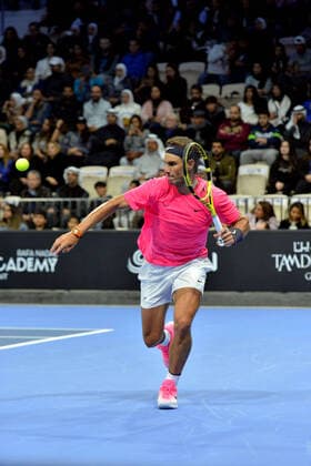 (200206) -- KUWAIT, Feb. 6, 2020 -- Rafael Nadal hits a return during an exhibition match between Rafael Nadal and David Ferrer at the opening ceremony of Rafa Nadal Academy in Hawalli Governorate, Kuwait, on Feb. 5, 2020. (Photo by Asad Xinhua) (SP)KUWAIT-HAWALLI GOVERNORATE-RAFA NADAL ACADEMY-OPENING NiexYunpeng 