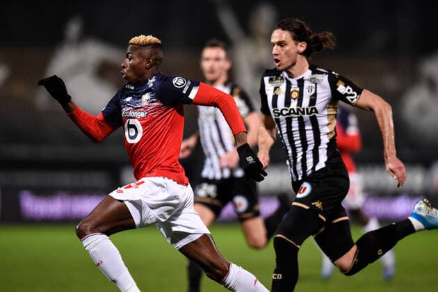 Victor Osimhen ( 7 - LOSC ) - PAVLOVIC Mateo (4 - Angers ) - FOOTBALL : SCO Angers vs Lille OSC - Ligue 1 - Angers - 07 02 2020 FedericoPestellini Panoramic 