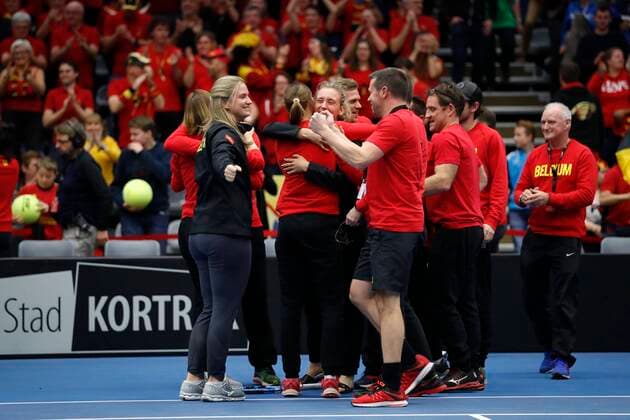KORTRIJK, BELGIUM - FEBRUARY 8 Belgian team celebrates - Kirsten Flipkens (Bel) between Zarina Diyas (Kaz) pictured during a second day of the Fed Cup Qualifiers game between Belgium against Kazakhstan on February 08, 2020 in Kortrijk, Belgium, 8 02 2020 TENNIS : Belgium Vs Kazakhstan - Fed Cup Qualifiers - 08 02 2020 PhotoNews Panoramic 