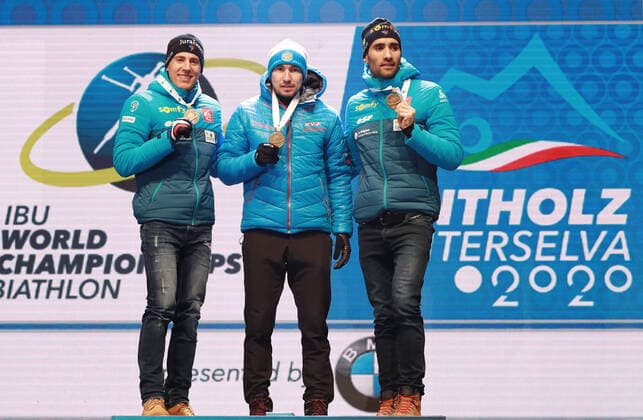 BIATHLON - IBU World Championships Antholz 2020 ANTHOLZ,ITALY,15.FEB.20 - BIATHLON - IBU World Championships 2020, 10km sprint men. Image shows Quentin Fillon Maillet (FRA), Alexander Loginov (RUS) and Martin Fourcade (FRA). Keywords: medal. GEPAxpictures xAndreasxPranter