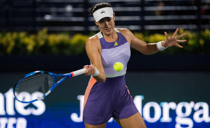 February 17, 2020, Dubai, UNITED ARAB EMIRATES: Garbine Muguruza of Spain in action during the first round of the 2020 Dubai Duty Free Tennis Championships WTA, Tennis Damen Premier tennis tournament against Kim Clijsters of Belgium 2020 Dubai Duty Free Tennis Championships, Tennis, Dubai, Unied Arab Emirates, Feb 17 - ZUMAa181 20200217_zaa_a181_105 Copyright: xAFP7x