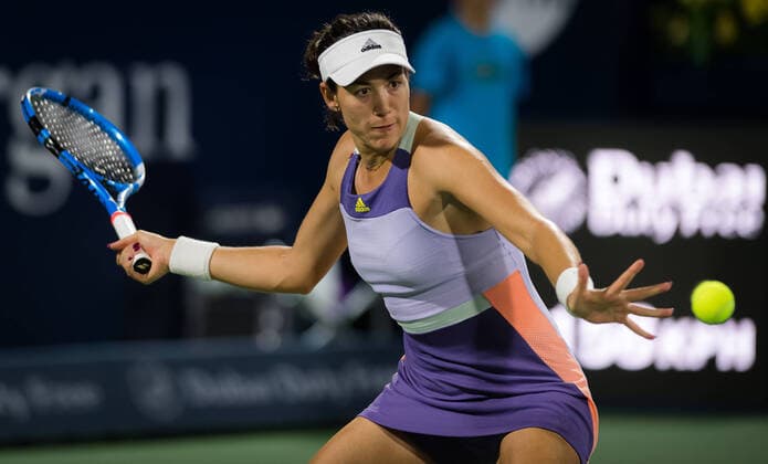 February 17, 2020, Dubai, UNITED ARAB EMIRATES: Garbine Muguruza of Spain in action during the first round of the 2020 Dubai Duty Free Tennis Championships WTA, Tennis Damen Premier tennis tournament against Kim Clijsters of Belgium 2020 Dubai Duty Free Tennis Championships, Tennis, Dubai, Unied Arab Emirates, Feb 17 - ZUMAa181 20200217_zaa_a181_107 Copyright: xAFP7x