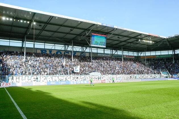 Fußball, Stadiongeschichte 1. FC Magdeburg 15.02.2020, xtgx, Fussball 3. Liga, 1.FC Magdeburg - Chemnitzer FC, v.l. Choreografie Magdeburg Fans (DFL DFB REGULATIONS PROHIBIT ANY USE OF PHOTOGRAPHS as IMAGE SEQUENCES and or QUASI-VIDEO) Magdeburg