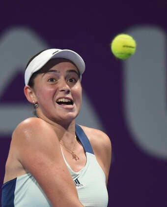 (200224) -- DOHA, Feb. 24, 2020 (Xinhua) -- Jelena Ostapenko of Latvia hits a return to Jil Teichmann of Switzerland during their women s singels first round match at 2020 WTA, Tennis Damen Qatar Open tennis tournament in Doha, Qatar, Feb. 23, 2020. (Photo by Nikku Xinhua) (SP)QATAR-DOHA-TENNIS-WTA-SINGLES 