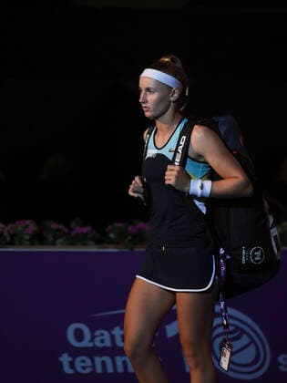 (200224) -- DOHA, Feb. 24, 2020 (Xinhua) -- Jil Teichmann of Switzerland walks into the court ahead of the women s singels first round match against Jelena Ostapenko of Latvia at 2020 WTA, Tennis Damen Qatar Open tennis tournament in Doha, Qatar, Feb. 23, 2020. (Photo by Nikku Xinhua) (SP)QATAR-DOHA-TENNIS-WTA-SINGLES 