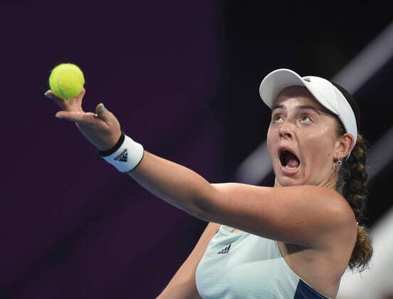 (200224) -- DOHA, Feb. 24, 2020 (Xinhua) -- Jelena Ostapenko of Latvia serves to Jil Teichmann of Switzerland during their women s singels first round match at 2020 WTA, Tennis Damen Qatar Open tennis tournament in Doha, Qatar, Feb. 23, 2020. (Photo by Nikku Xinhua) (SP)QATAR-DOHA-TENNIS-WTA-SINGLES 