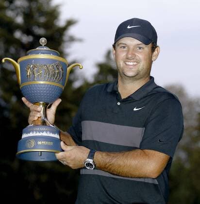 Golf: WGC-Mexico Championship Patrick Reed of the United States lifts the trophy after winning the WGC-Mexico Championship at Club de Golf Chapultepec in Mexico City on Feb. 23, 2020. 