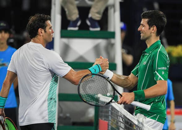 Malek Jaziri gratuliert dem Sieger Novak Djokovic (SRB) Tennis - Dubai Duty Free Tennis Championships - ATP, Tennis Herren - Dubai Duty Free Tennis Stadium - Dubai - - United Arab Emirates - 24 February 2020. Copyright: xJuergenxHasenkopfx