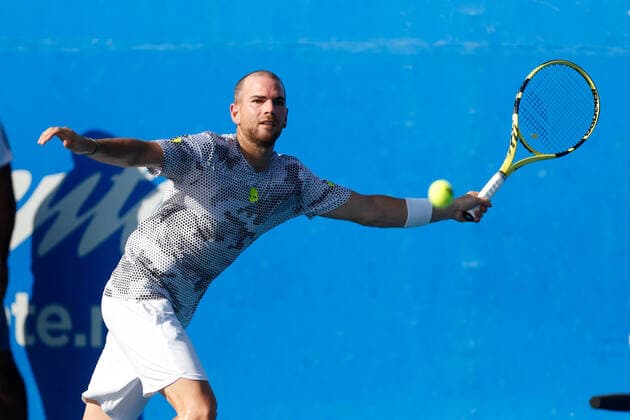 (200225) -- ACAPULCO, Feb. 25, 2020 -- Adrian Mannarino of France hits a return to Cameron Norrie of Britain during their men s singles first round match at the 2020 ATP, Tennis Herren Mexican Open tennis tournament in Acapulco, Mexico, Feb. 24, 2020. ) (SP)MEXICO-ACAPULCO-TENNIS-ATP-MEXICAN OPEN-DAY 1 XinxYuewei 