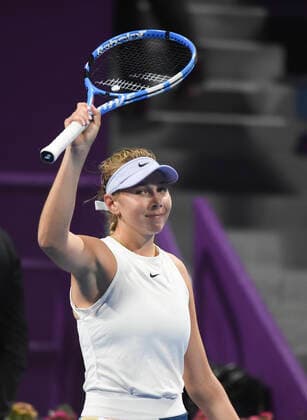 (200225) -- DOHA, Feb. 25, 2020 (Xinhua) -- Amanda Anisimova of the United States celebrates after winning the women s singles second round match against Elina Svitolina of Ukraine at the 2020 WTA, Tennis Damen Qatar Open in Doha, Qatar, Feb. 24, 2020. (Photo by Nikku Xinhua) (SP)QATAR-DOHA-TENNIS-WTA-SINGLES 