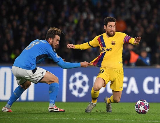 (200226) -- NAPLES, Feb. 26, 2020 (Xinhua) -- FC Barcelona, Barca s Lionel Messi (R) vies with Napoli s Fabian Ruiz during the UEFA Champions League round of 16 first leg match between Napoli and Barcelona in Naples, Italy, Feb. 25, 2020. (Photo by Alberto Lingria Xinhua) (SP)ITALY-NAPLES-FOOTBALL-UEFA CHAMPIONS LEAGUE-NAPOLI VS BARCELONA 