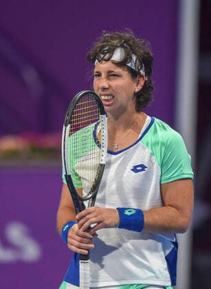 (200226) -- DOHA, Feb. 26, 2020 (Xinhua) -- Carla Suarez Navarro of Spain reacts during the women s singles second round match against Petra Kvitova of the Czech Republic at the 2020 WTA, Tennis Damen Qatar Open in Doha, Qatar, Feb. 25, 2020. (Photo by Nikku Xinhua) (SP)QATAR-DOHA-TENNIS-WTA-SINGLES 