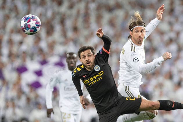 Real Madrid s Sergio Ramos and Manchester City s Riyad Mahrez during UEFA Champios League match. February 26, 2020. (2020022616)
