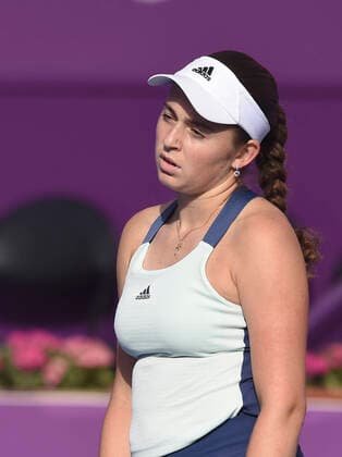 (200227) -- DOHA, Feb. 27, 2020 (Xinhua) -- Jelena Ostapenko of Latvia reacts during the women s singles third round match against Petra Kvitova of the Czech Republic at the 2020 WTA, Tennis Damen Qatar Open in Doha, Qatar, Feb. 26, 2020. (Photo by Nikku Xinhua) (SP)QATAR-DOHA-TENNIS-WTA-SINGLES 