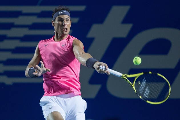(200227) -- ACAPULCO, Feb. 27, 2020 (Xinhua) -- Rafael Nadal of Spain hits a return during the men s singles second round match between Rafael Nadal of Spain and Miomir Kecmanovic of Serbia at the 2020 ATP, Tennis Herren Mexican Open tennis tournament in Acapulco, Mexico, Feb. 26, 2020. (Photo by Francisco Canedo Xinhua) (SP)MEXICO-ACAPULCO-TENNIS-ATP-MEXICAN OPEN 