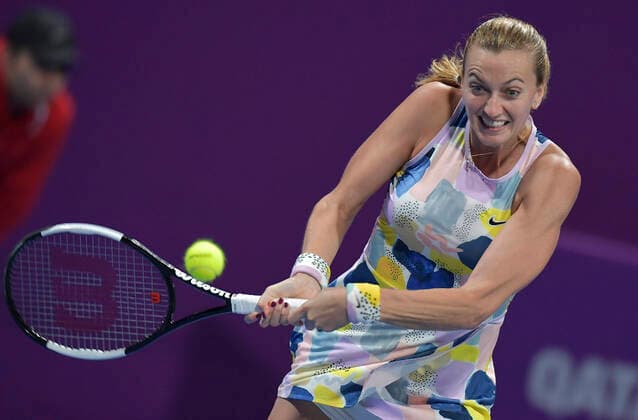 (200228) -- DOHA, Feb. 28, 2020 (Xinhua) -- Petra Kvitova of the Czech Republic hits a return during the women s singles quarterfinal match against Ons Jabeur of Tunisia at the 2020 WTA, Tennis Damen Qatar Open in Doha, Qatar, Feb. 27, 2020. (Photo by Nikku Xinhua) (SP)QATAR-DOHA-TENNIS-WTA-SINGLES 