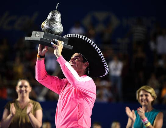(200301) -- ACAPULCO, March 1, 2020 -- Rafael Nadal of Spain poses with his trophy during the awarding ceremony after winning the men s singles final match between Rafael Nadal of Spain and Taylor Fritz of the United States at the 2020 ATP, Tennis Herren Mexican Open tennis tournament in Acapulco, Mexico, Feb. 29, 2020. ) (SP)MEXICO-ACAPULCO-TENNIS-ATP-MEXICAN OPEN-FINALS XinxYuewei 