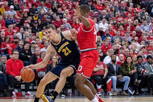 March 1, 2020, Columbus, Ohio, U.S: Michigan Wolverines guard Franz Wagner (21) drives the baseline against Ohio State Buckeyes forward E.J. Liddell (32) in the game between the Michigan Wolverines and the Ohio State Buckeyes at the Value City Arena, Columbus, Ohio. NCAA, College League, USA Basketball 2020 - Michigan vs Ohio State - ZUMAs304 20200301_zaf_s304_079 Copyright: xScottxStuartx
