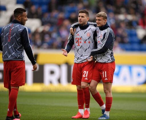 29.02.2020, Fussball 1. Bundesliga 2019 2020, 24. Spieltag, TSG Hoffenheim - FC Bayern München, in der PreZero-Arena Sinsheim. Beim Aufwärmen, v.li: Corentin Tolisso (FC Bayern München), Lucas Hernandez (FC Bayern München), Michael Cuisance (FC Bayern München).