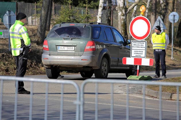 Staff control a driver outside the Vysocina Arena in Nove Mesto na Morave, South Moravia, Czech Republic, where the World Biathlon Cup will take place from March 5 to March 8, 2020, is seen on March 5, 2020. The cup will be held without the audience present in connection with the novel coronavirus outbreak. (CTKxPhoto LiborxPlihal) CTKPhotoP202003050750301 PLI 2