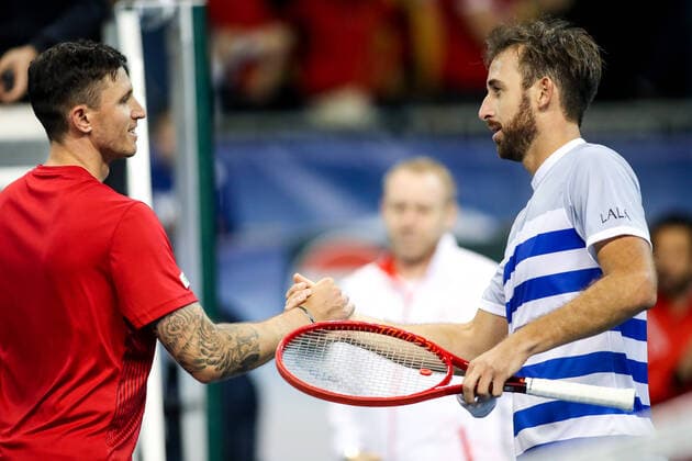 TENNIS - Davis Cup, AUT vs URU PREMSTAETTEN,AUSTRIA,06.MAR.20 - TENNIS - ITF Davis Cup, Austria vs Uruguay. Image shows Dennis Novak (AUT) and Martin Cuevas (URU). GEPAxpictures xMaticxKlansek