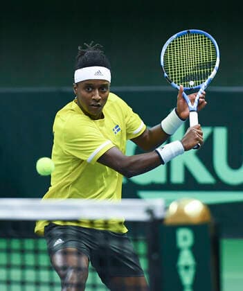 STOCKHOLM 20200306 Sweden s Mikael Ymer return to Chile s Marcelo Tomas Barrios Vera during qualifying game for the Davis Cup playoff between Sweden and Chile in the Royal Tennis Hall in Stockholm on March 6, 2020. Photo Erik Simander TT kod 11720 Stockholm Sweden x11720x