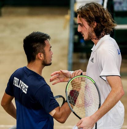 (200307) -- MANILA, March 7, 2020 -- Stefanos Tsitsipas (R) of Greece greets Jeson Patrombon of the Philippines after their match during the Davis Cup World Group II Play-Offs First Round doubles match between the Philippines and Greece in Manila, the Philippines on March 7, 2020. ) (SP)PHILIPPINES-MANILA-TENNIS-DAVIS CUP-GREECE VS PHILIPPINES ROUELLExUMALI 