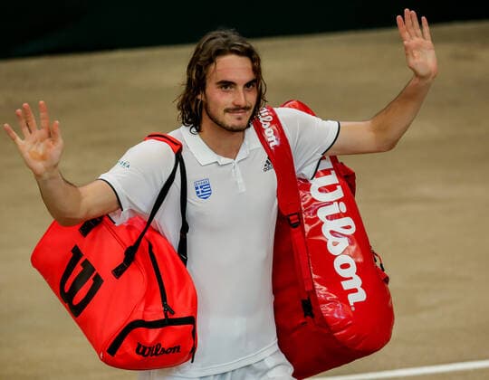 (200307) -- MANILA, March 7, 2020 -- Stefanos Tsitsipas of Greece waves to the audience after winning his match against Jeson Patrombon of the Philippines during the Davis Cup World Group II Play-Offs First Round doubles match between the Philippines and Greece in Manila, the Philippines on March 7, 2020. ) (SP)PHILIPPINES-MANILA-TENNIS-DAVIS CUP-GREECE VS PHILIPPINES ROUELLExUMALI 