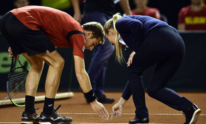 Belgian Kimmer Coppejans ATP, Tennis Herren 154) pictured with the referee during a tennis match against Hungarian Balazs (ATP 76), the fourth rubber of the first round qualifiers in the Davis Cup World Group between Belgium and Hungary, Saturday 07 March 2020, in Debrecene, Hungary. ERICxLALMAND  x2485671x
