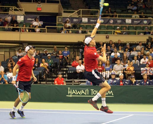 March 7, 2020 - Bob Bryan (USA) returns volley with Mike Bryan (USA) behind him during a Davis Cup by Rakuten Qualifier doubles match between Sanjar Fayziev (UZB) Denis Istomin (UZB) and Bob Bryan (USA) Mike Bryan (USA) at the Neal Blaisdell Center in Honolulu, HI - CSM Honolulu USA - ZUMAc04_ 20200307_zaf_c04_284 Copyright: xMichaelxSullivanx