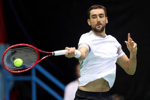 (200308) -- ZAGREB, March 8, 2020 -- Marin Cilic of Croatia hits a return during the match against Sumit Nagal of India at the Davis Cup Qualifiers between Croatia and India in Zagreb, Croatia, March 7, 2020. ( Pixsell via Xinhua) (SP)CROATIA-ZAGREB-TENNIS-DAVIS CUP-QUALIFIERS GoranxStanzl 
