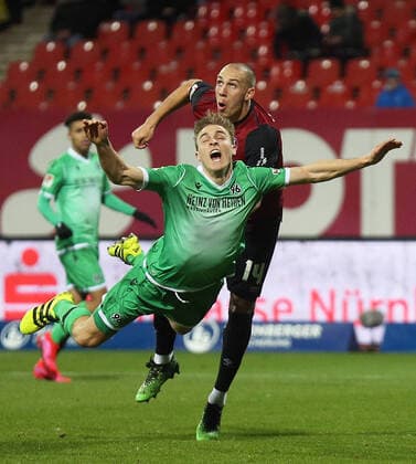 2020, 23.02.2020, 1. FC Nürnberg - Hannover 96, v.l. Aktion, Zweikampf, Spielszene, action, Hübers Timo, Hannover 96, Michael Frey, 1. FC Nürnberg,