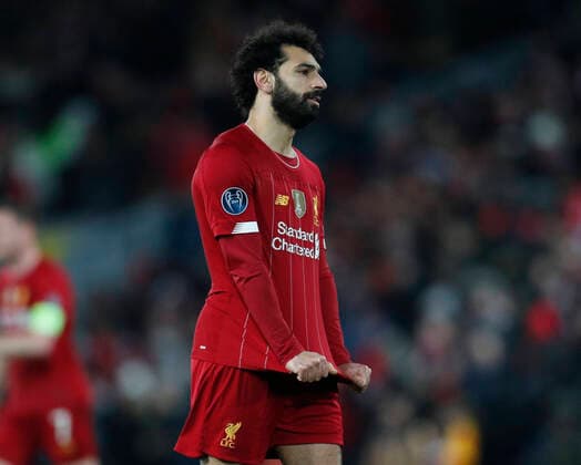 Mohamed Salah of Liverpool pulls at his shirt in frustration during the UEFA Champions League match at Anfield, Liverpool. Picture date: 11th March 2020. Picture credit should read: Darren Staples Sportimage EDITORIAL USE ONLY. No use with unauthorised audio, video, data, fixture lists, club league logos or live services. Online in-match use limited to 120 images, no video emulation. No use in betting, games or single club league player publications. SPI-0539-0103