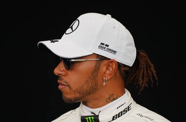 motor racing, Motorsport F1 GRAND PRIX, Lewis Hamilton of Great Britain and Mercedes GP poses for a photo in the Paddock ahead of the Formula 1 Australian Grand Prix 2020 at the the Albert Park Circuit in Melbourne, Thursday, March 12, 2020. ( NO ARCHIVING, EDITORIAL USE ONLY, NO USE IN BOOKS WITHOUT CONSENT MELBOURNE VIC AUSTRALIA  Copyright: xSCOTTxBARBOURx 20200312001456107931