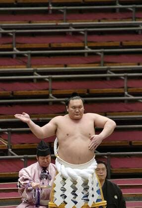 Sumo: Spring tournament without fans Grand champion Hakuho performs a ring-entering ceremony during the Spring Grand Sumo Tournament at an empty Edion Arena Osaka on March 12, 2020. The tournament has been held behind closed doors due to the coronavirus outbreak. 