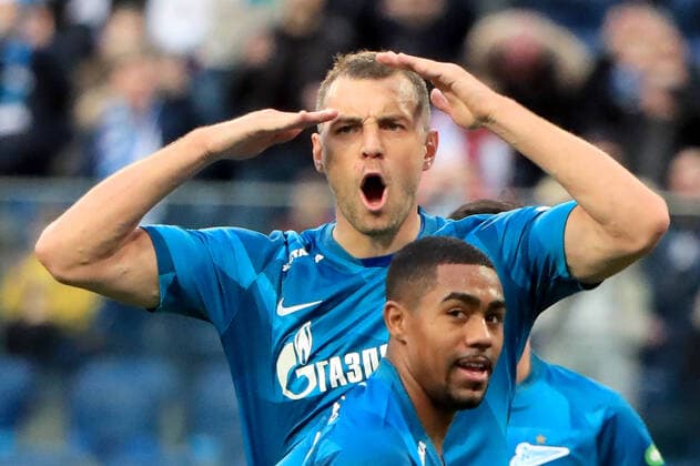 ST PETERSBURG, RUSSIA - MARCH 14, 2020: Zenit St Petersburgâ€™s Malcom (front) and Artem Dzyuba celebrate after scoring in the 2019 20 Russian Football Premier League Round 22 football match between Zenit St Petersburg and Ural Yekaterinburg at Gazprom Arena. Peter Kovalev TASS  TS0D20BF