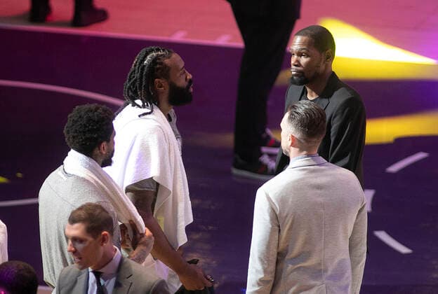 March 18, 2020, Los Angeles, California, USA: Kevin Durant reported that he tested positive for coronavirus. Durant attended the game against the Los Angeles Lakers. It was the last game before the NBA, Basketball Herren, USA suspended the NBA season. FILE PHOTO: Kevin Durant of the Brooklyn Nets talks with teammates DeAndre Jordan 6 during their NBA game with the Los Angeles Lakers on Tuesday March 10, 2020 at the Staples Center in Los Angeles, California. Lakers lose to Nets, 102-104. JAVIER ROJAS PI Los Angeles USA - ZUMAp124 20200318_zaa_p124_007 Copyright: xJavierxRojasx