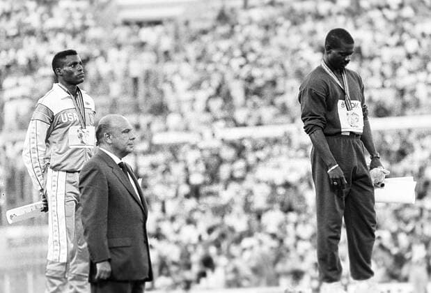 870830 Athletics, World Athletics Championships: Winner Ben Johnson, Canada, and 2nd placed Carl Lewis, USA, react on the podium after the 100 m final at The World Athletics Championships on August 30, 1987 in Rome, Italy. BILDBYRAN *** 870830 Athletics, World Athletics Championships Winner Ben Johnson, Canada, and 2nd placed Carl Lewis, USA, react on the podium after the 100 m final at The World Athletics Championships on August 30, 1987 in Rome, Italy BILDBYRAN,  Copyright: BILDBYRAN 870830017