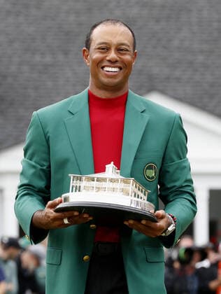 Golf: Tiger Woods Photo taken April 14, 2019, shows Tiger Woods with the Masters trophy and green jacket after winning the tournament in Augusta, Georgia. 