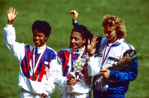 Florence Griffith Joyner competing at the 1988 Olympic Summer Games Florence Griffith Joyner (USA) -C- with Evelyn Ashford (USA) and Heike Drechsler (GDR) at the 1988 Olympic Summer Games Seoul South Korea Copyright: xStevenxExSutton DUOMO PCNx TF1202_018260_88_OLY