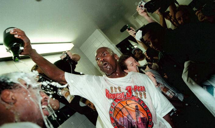 June 14, 1998, USA: Michael Jordan pours bubbly on Dennis Rodman inside the locker room after winning the NBA, Basketball Herren, USA title on June 14, 1998. USA - ZUMAm67_ 19980614_zaf_m67_003 Copyright: xCharlesxCherneyx