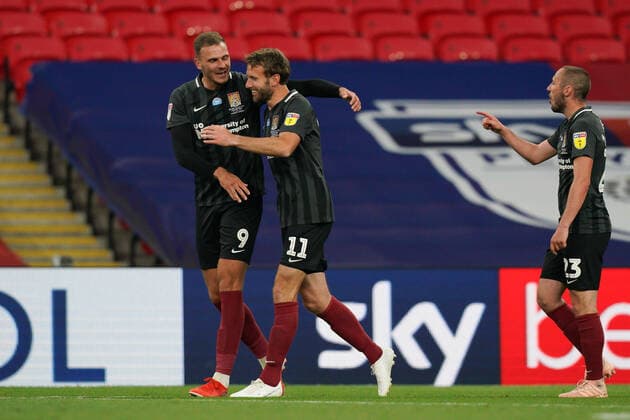 Andy Williams of Northampton Town (2nd left) celebrates after he scores his team?s fourth goal during the Sky Bet League 2 PLAY-OFF Final match between Exeter City and Northampton Town at Wembley Stadium, London, England on 29 June 2020. Copyright: xAndyxRowlandx PMI-3511-0105