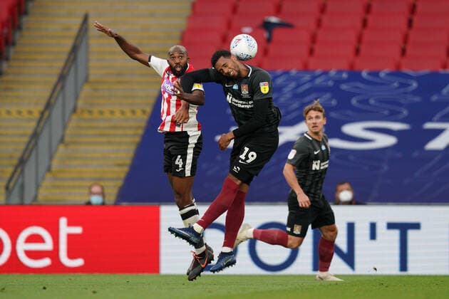 Nigel Atangana of Exeter City and Vadaine Oliver of Northampton Town in an aerial battle during the Sky Bet League 2 PLAY-OFF Final match between Exeter City and Northampton Town at Wembley Stadium, London, England on 29 June 2020. Copyright: xAndyxRowlandx PMI-3511-0131