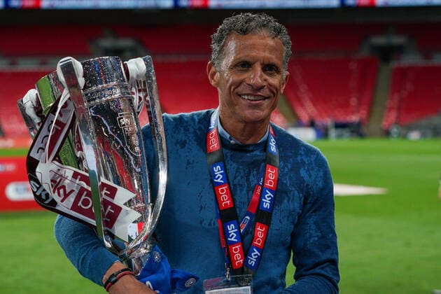 Northampton Town manager Keith Curle celebrates promotion to League One with the trophy after a 4-0 victory in the Sky Bet League 2 PLAY-OFF Final match between Exeter City and Northampton Town at Wembley Stadium, London, England on 29 June 2020. Copyright: xAndyxRowlandx PMI-3511-0140