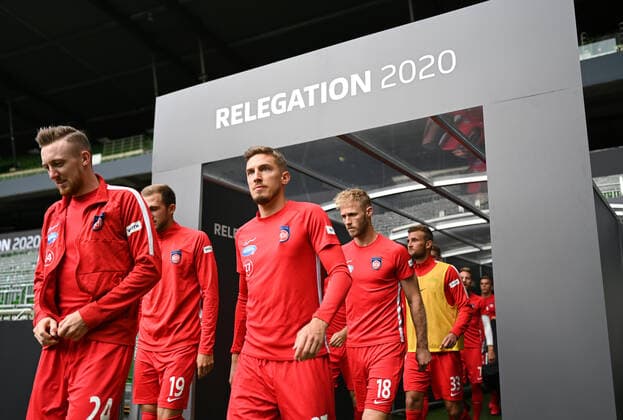 Werder Bremen - 1. FC Heidenheim Fußball, Relegation, Werder Bremen - 1. FC Heidenheim: Die Spieler des FC Heidenheim kommen zum Aufwaermen: Tobias Mohr (Heidenheim), Jonas Foehrenbach (Heidenheim), Sebastian Griesbeck (Heidenheim). Photo: Marvin Ibo Güngör GES Pool via xim.gs DFL regulations prohibit any use of photographs as image sequences and or quasi-video. Editorial use only. National and international news agencies out. Bremen Deutschland